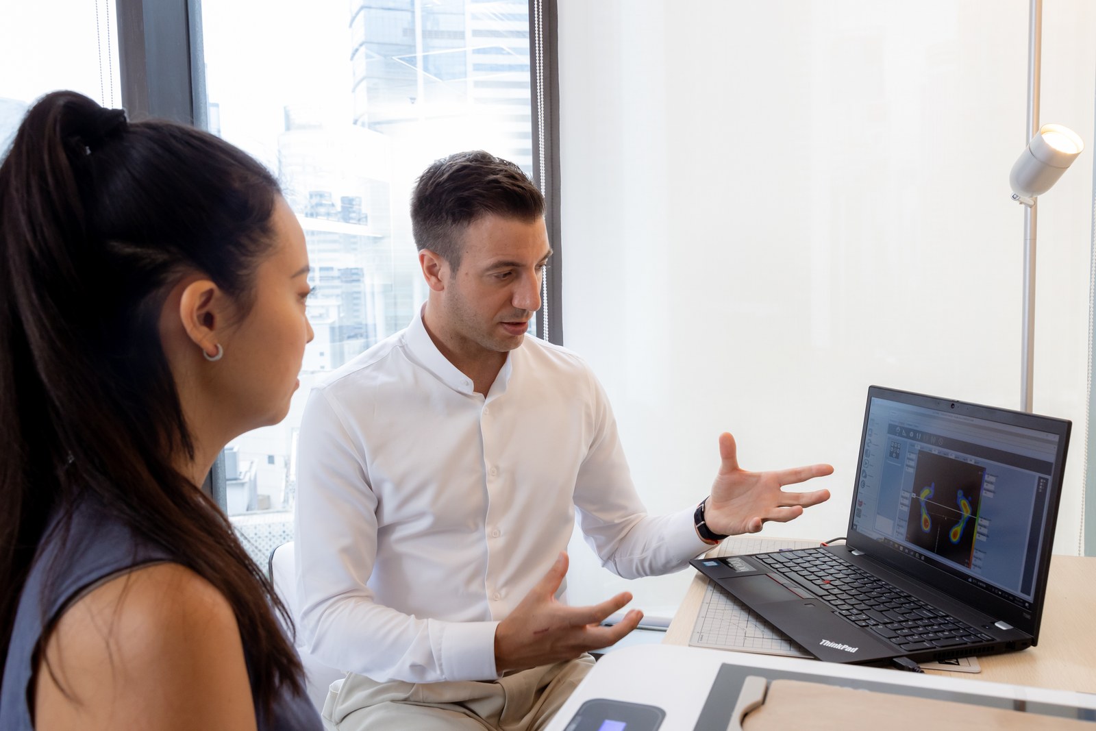 Albin Brion advising a client at the Foot Atelier, Central Hong Kong