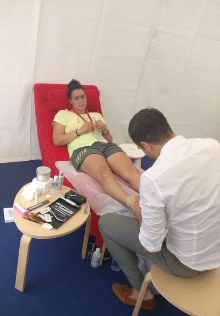 Albin Brion treating tennis champion Ons Jabeur